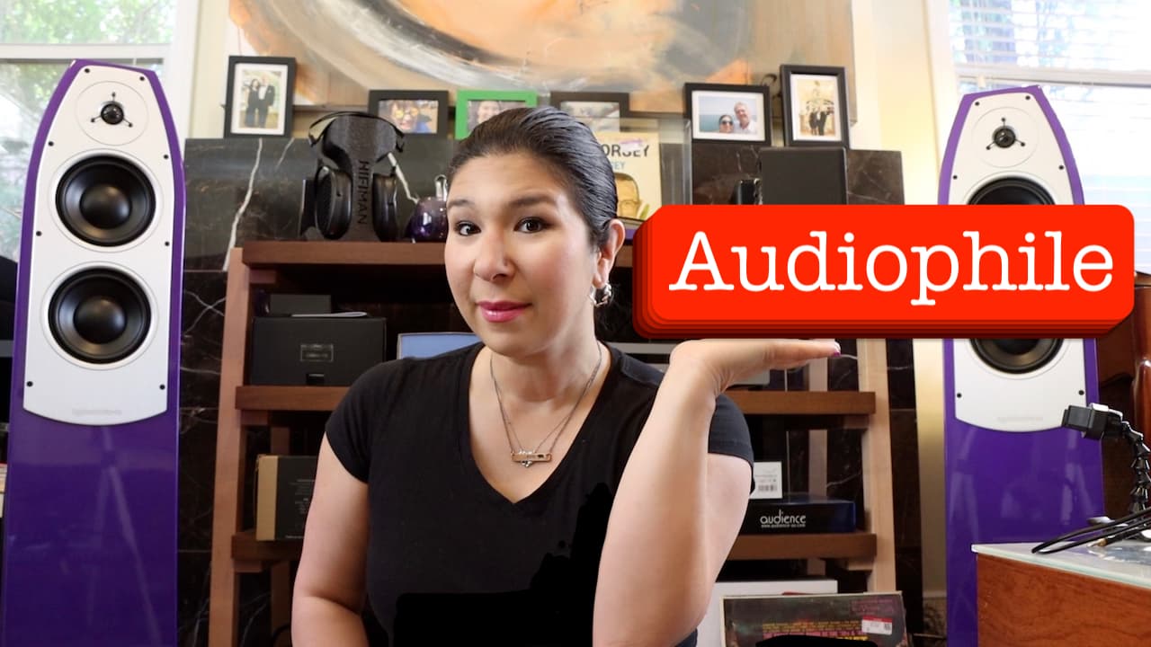 Emiko holding up the word Audiophile