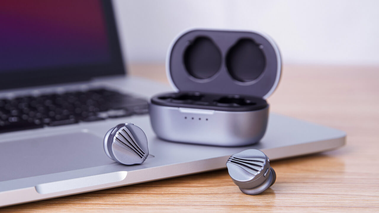 FiiO FW3 True Wireless Earbuds next to charging case