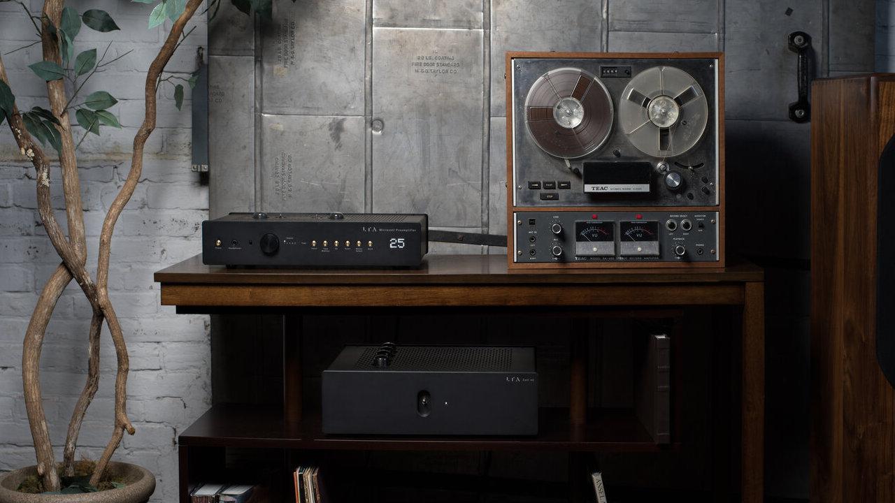 Linear Tube Audio MicroZOTL Preamplifier front view next to reel-to-reel machine